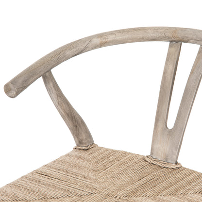 weathered grey wooden counter stool with curved back and woven seagrass seat