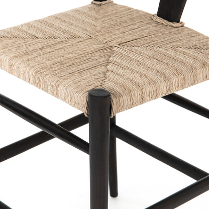 black wooden counter stool with curved back and woven seagrass seat