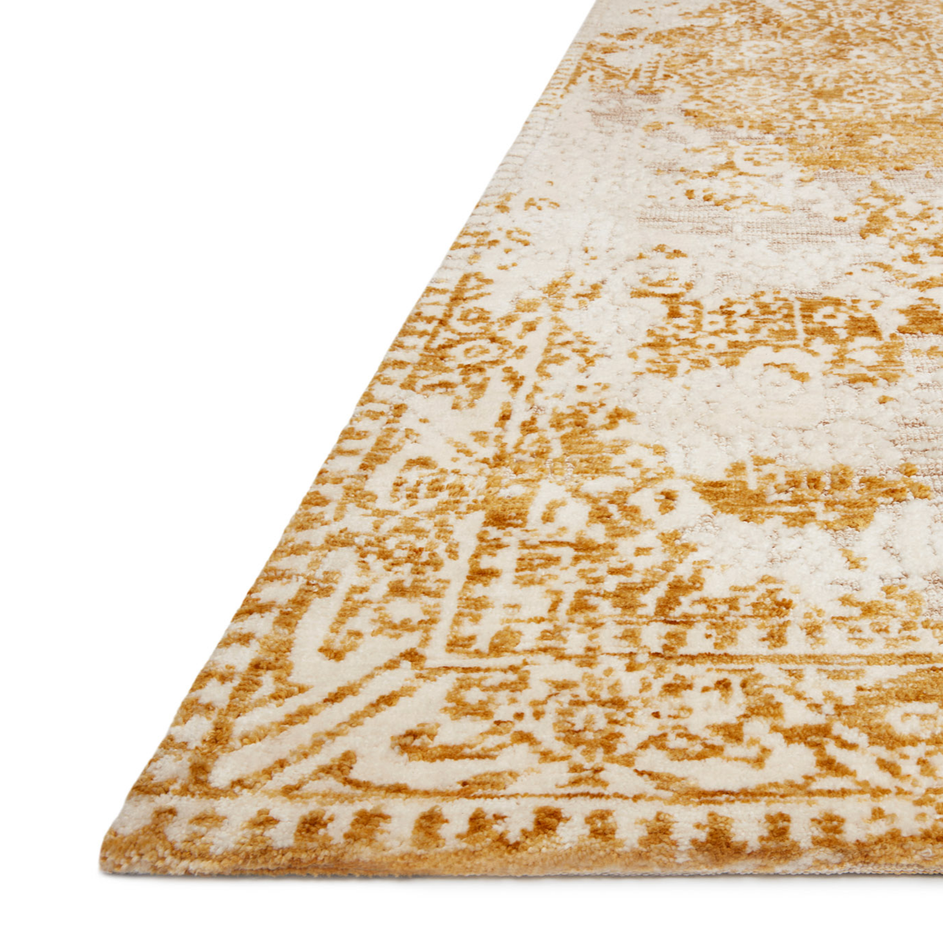 golden yellow distressed area rug with floral detail