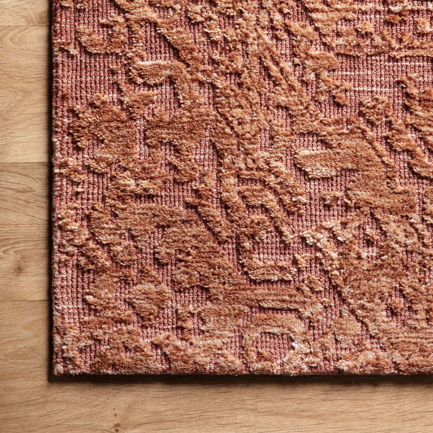 modern deep pink area rug with distressed detail