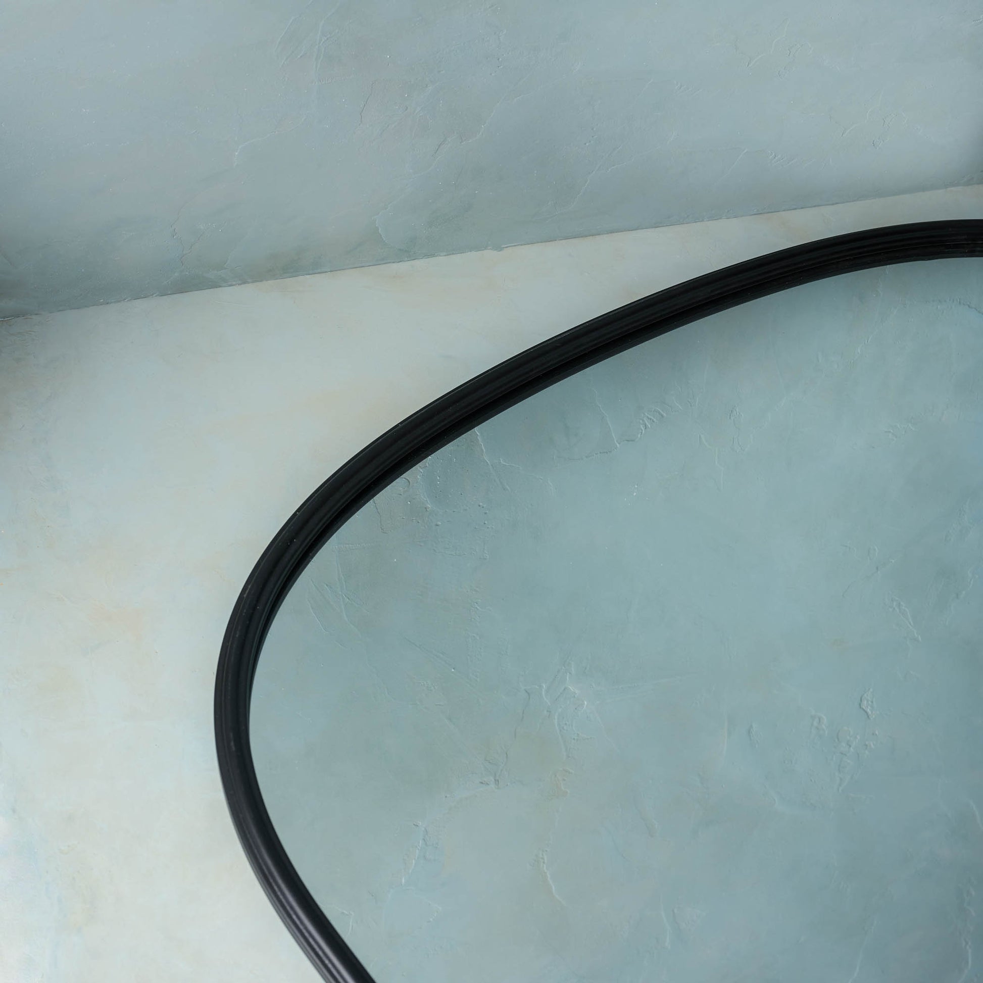 close up view of arched top on Archer Metal Framed Mirror