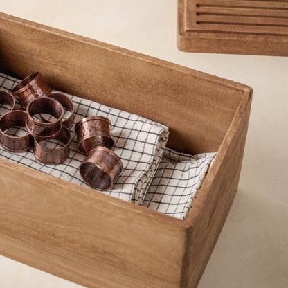 Magnolia Antiqued Wood Storage Box containing napkins