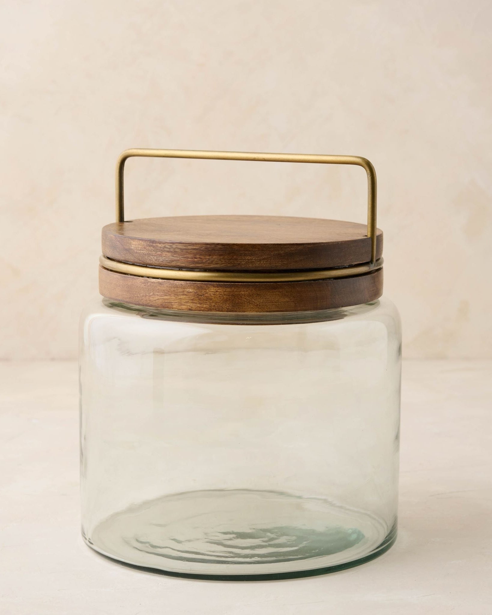 magnolia glass canister with wood and antique brass lid