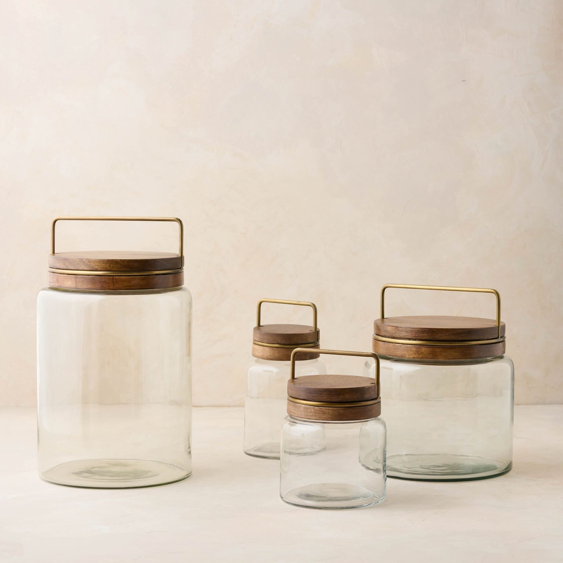 magnolia glass canister with wood and antique brass lid