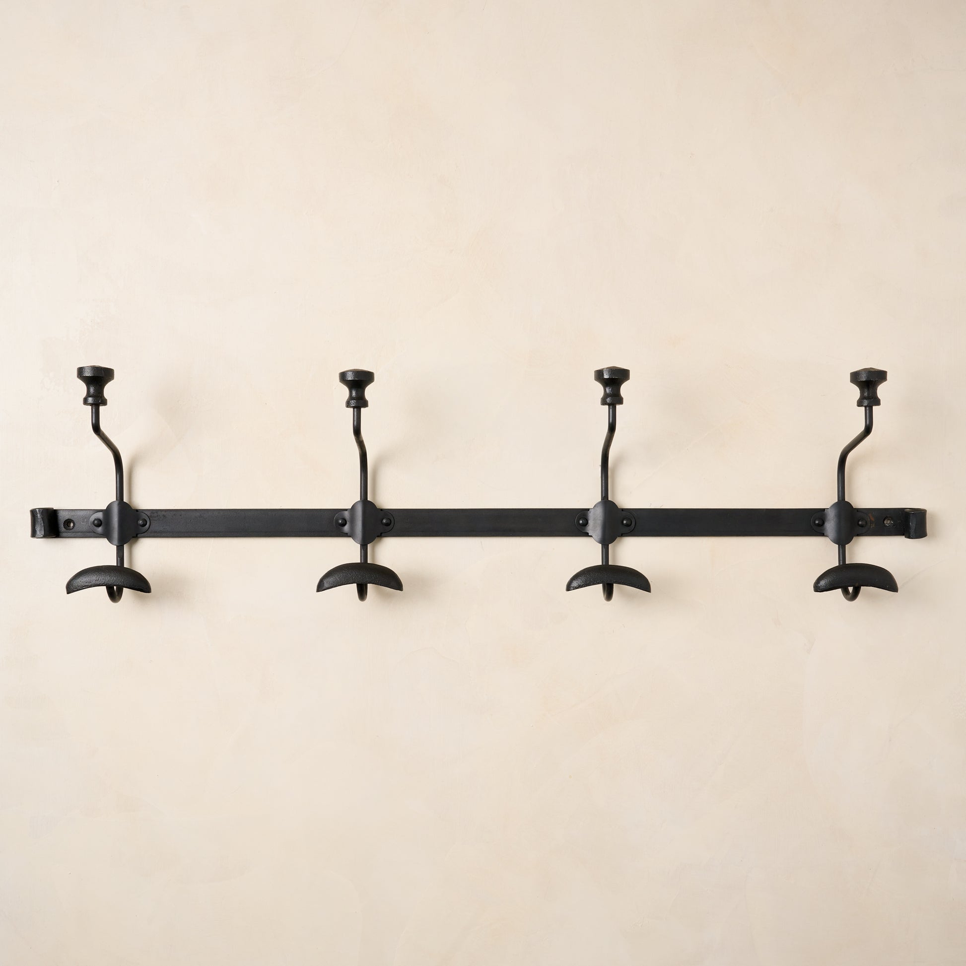 long duke metal wall hook with four hooks. 