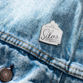 branded magnolia silos enamel pin