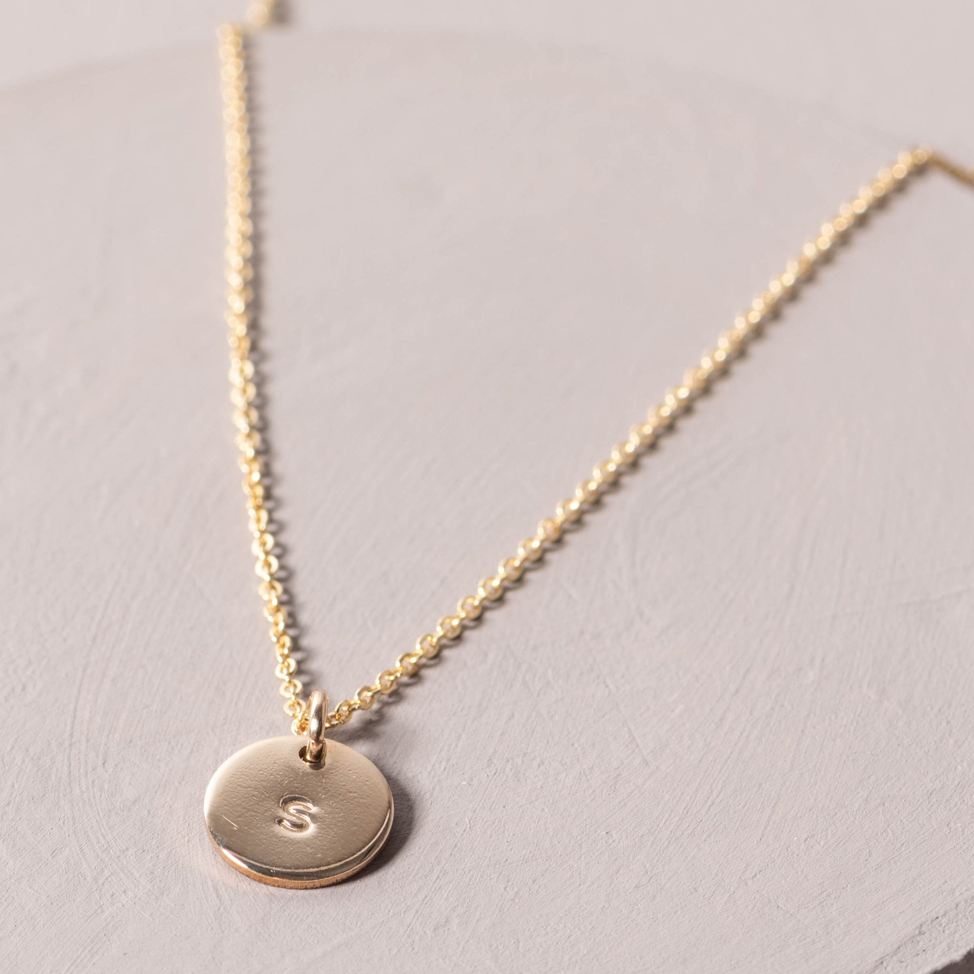 magnolia gold initial disc necklace