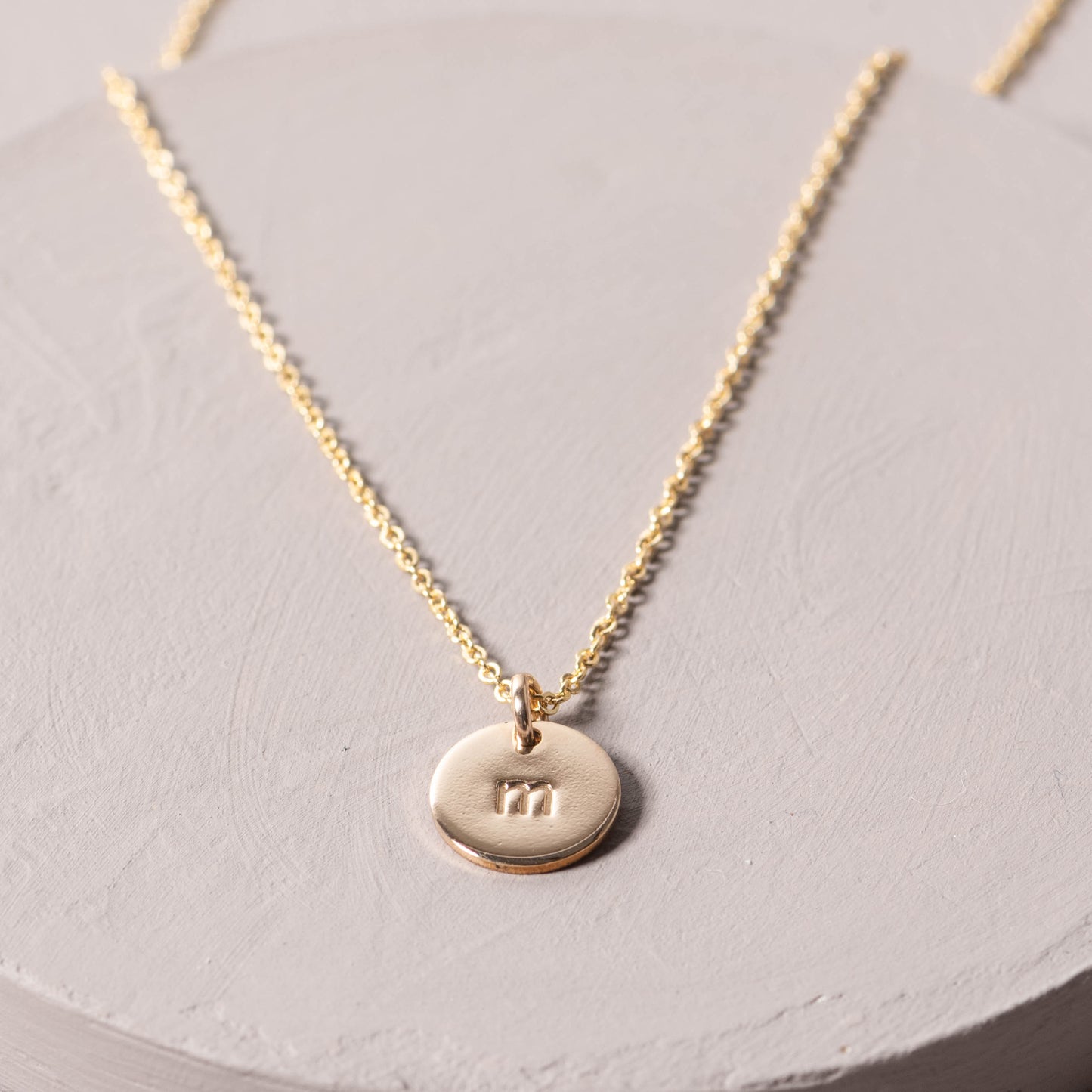 magnolia gold initial disc necklace