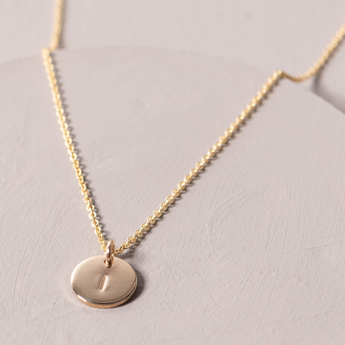 magnolia gold initial disc necklace