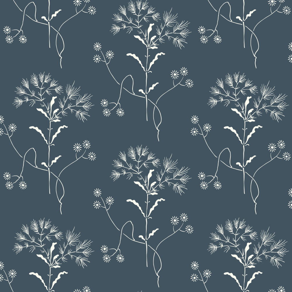 white wildflower pattern on blue wallpaper