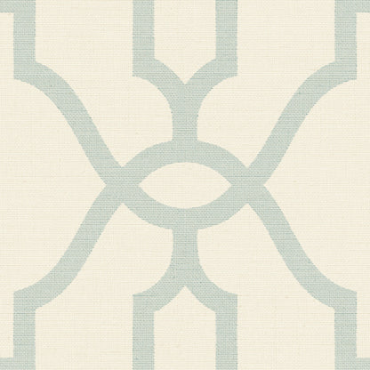 light blue trellis pattern on cream wallpaper