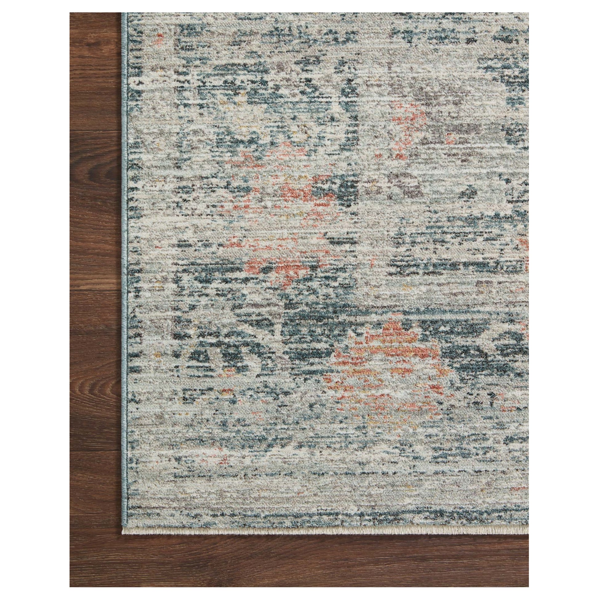 Millie Blue Multi Rug corner on wood floor
