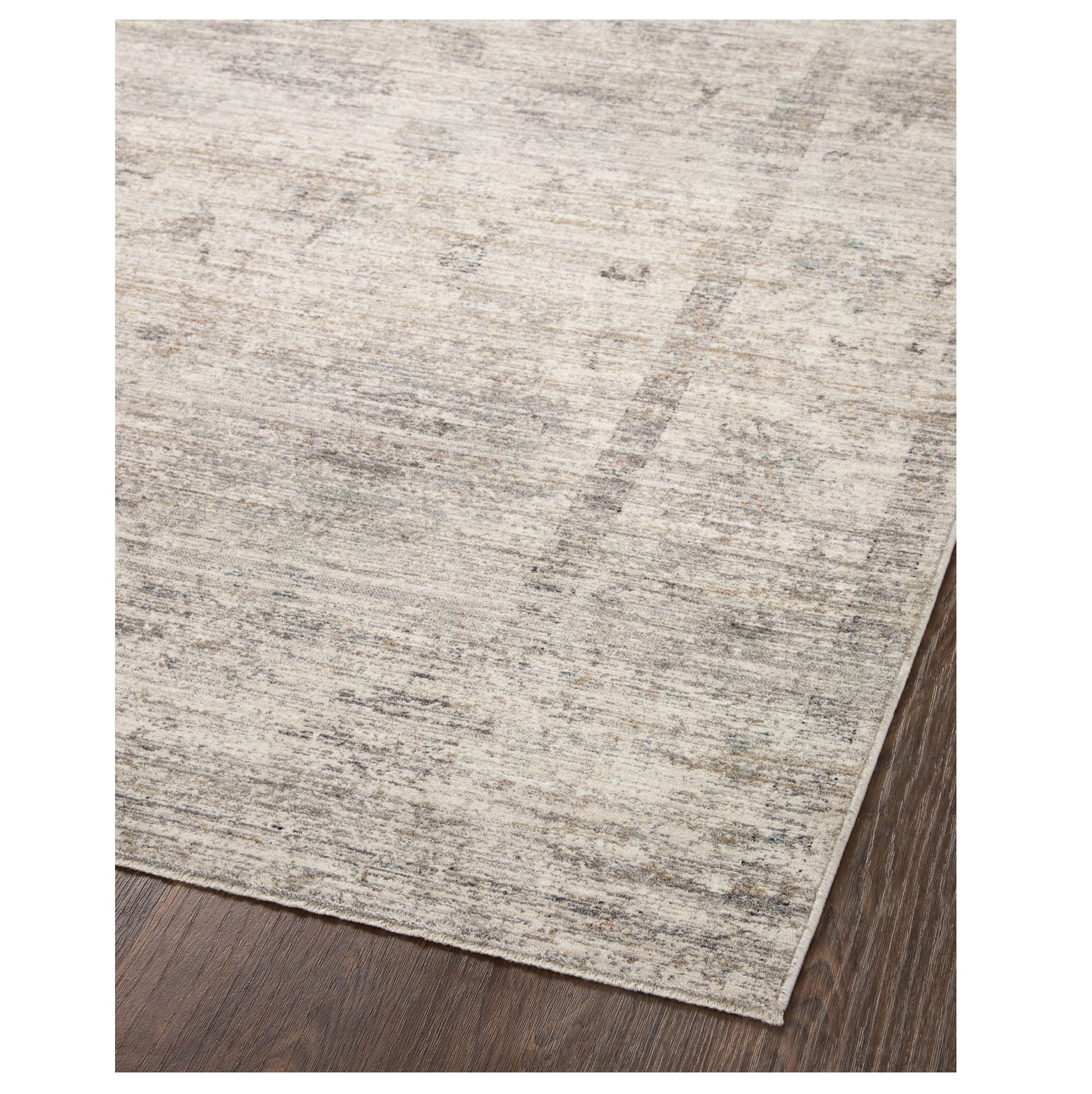 Millie Silver Dove Rug corner on wood floor