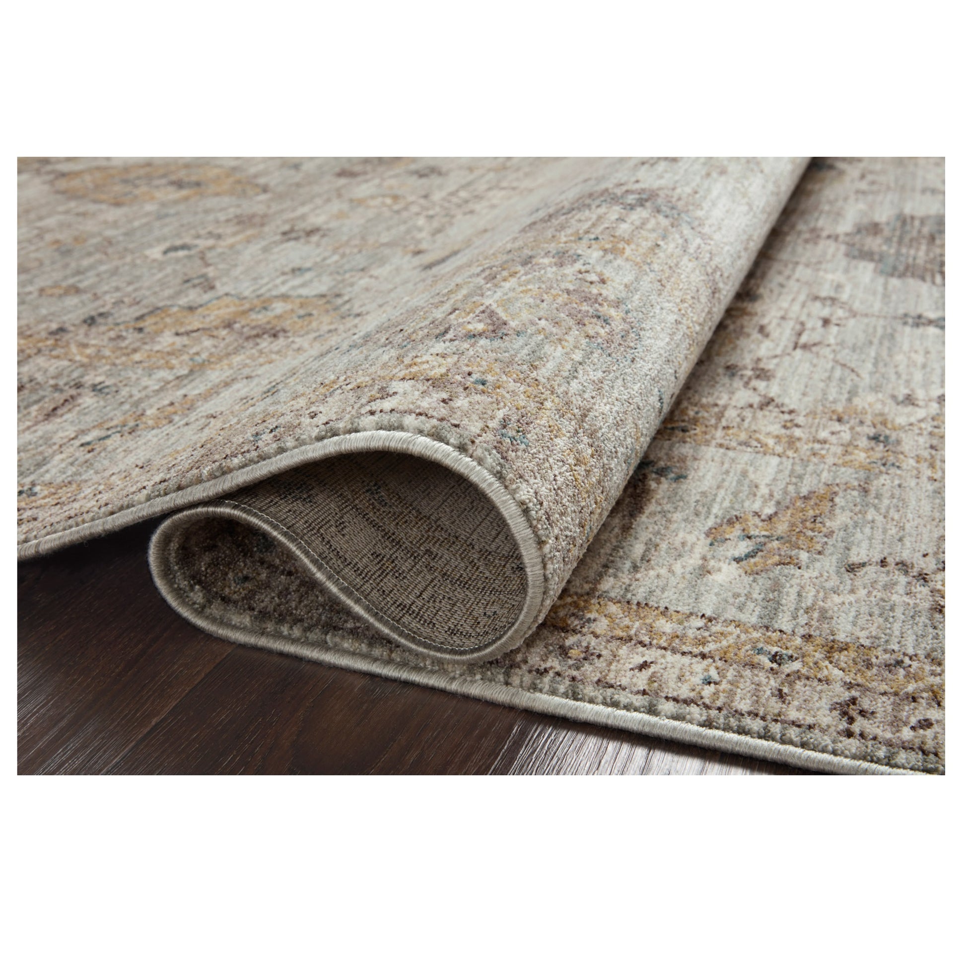 Millie Sky Gold Rug rolled