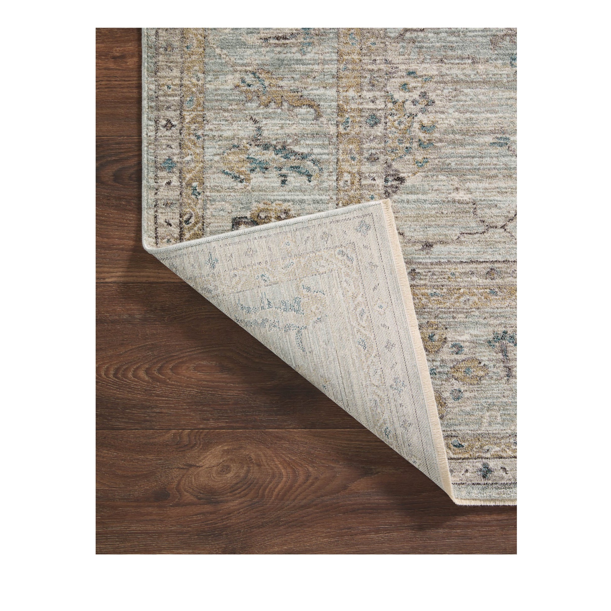 Millie Sky Gold Rug corner flipped up