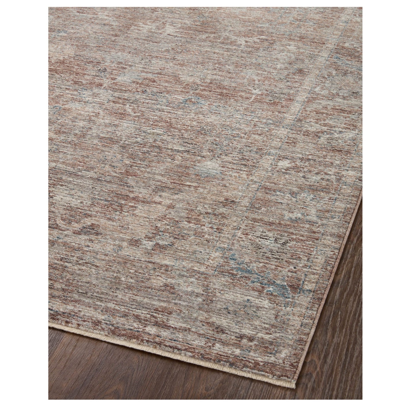 Millie Brick Fog Rug corner on wood floor
