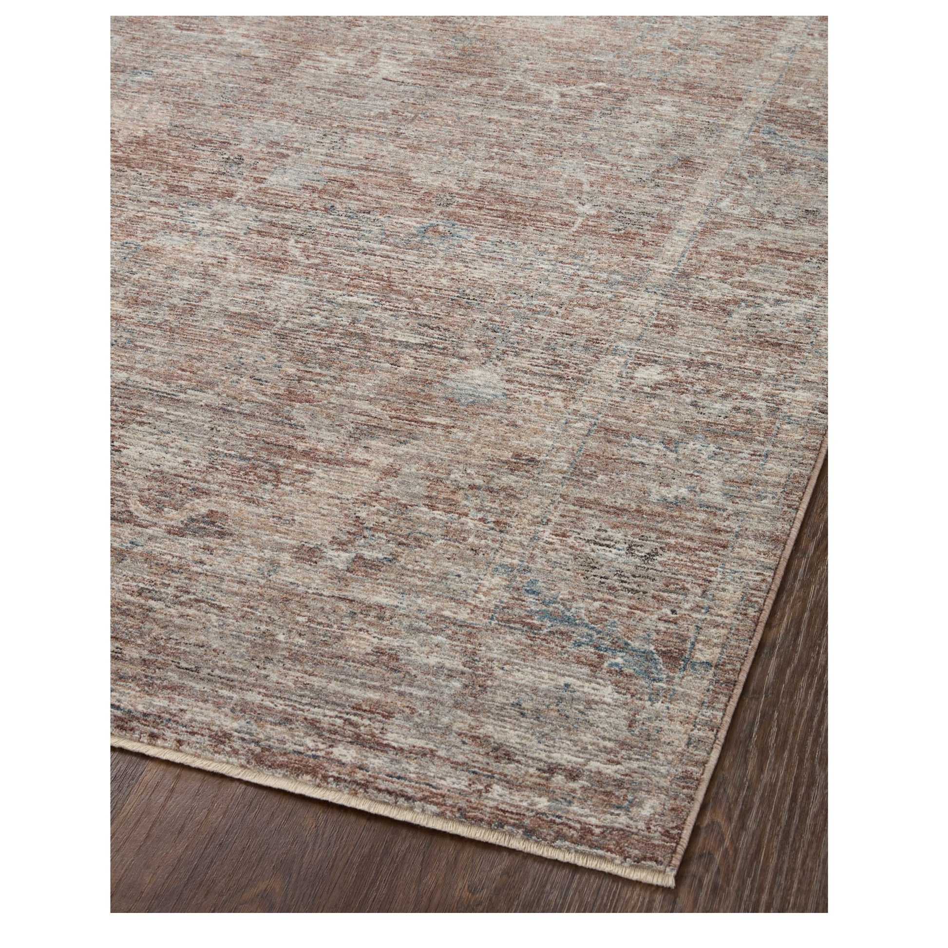 Millie Brick Fog Rug corner on wood floor