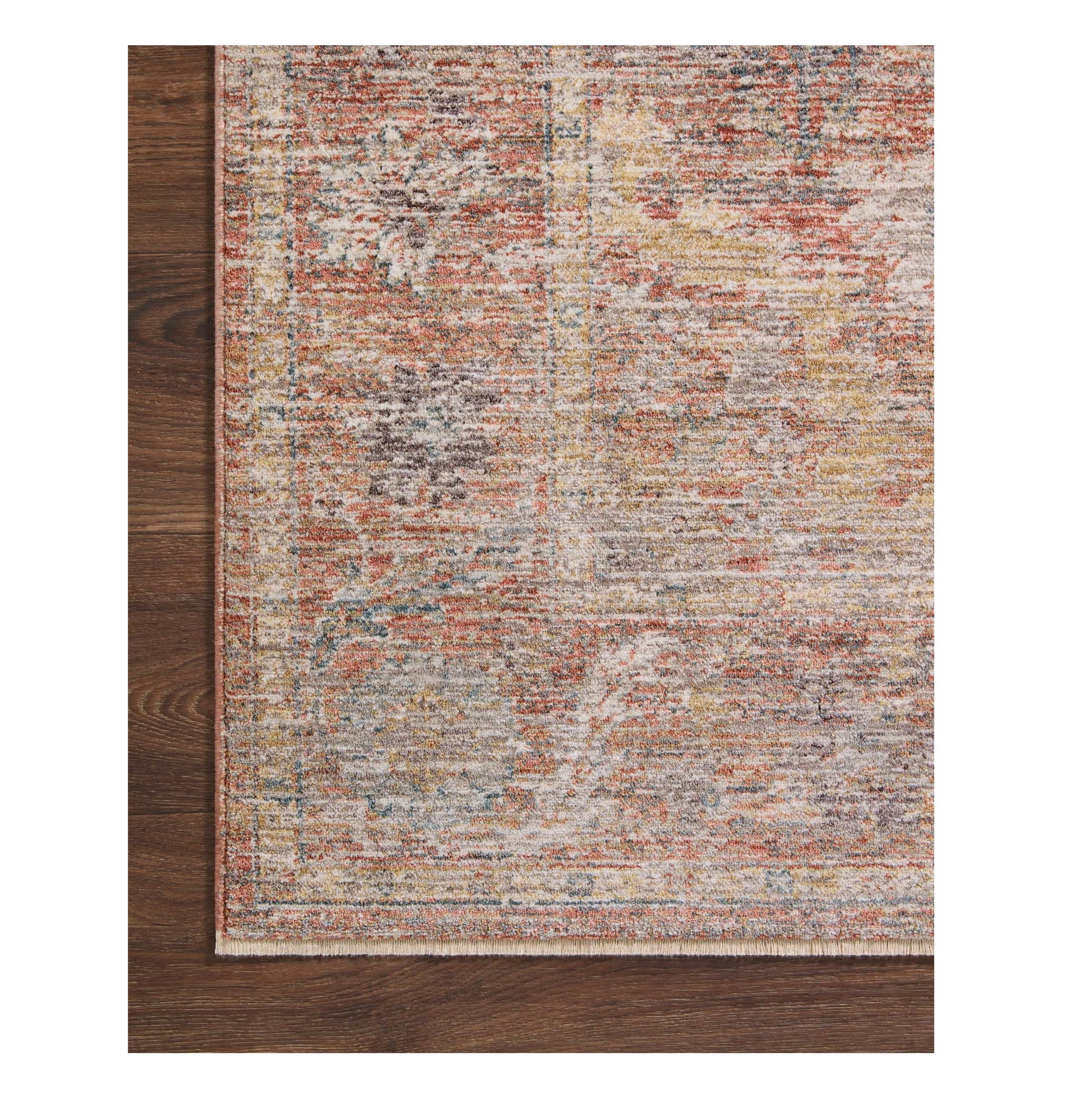 Millie Sunset Multi Rug corner on wood floor