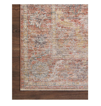 Millie Sunset Multi Rug corner on wood floor
