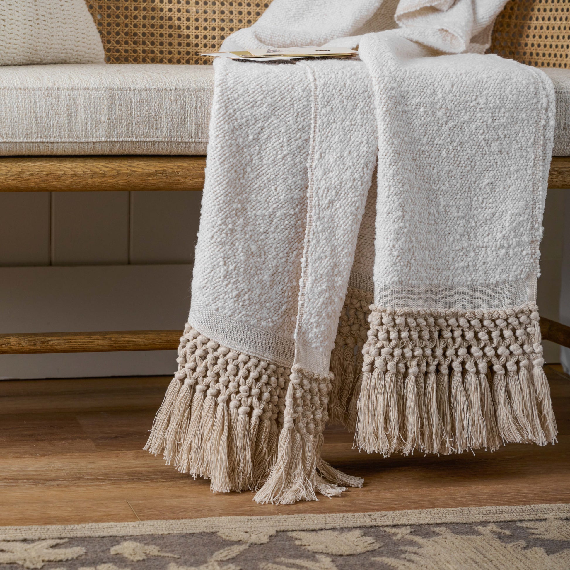 Angora Tassel Throw on an entryway bench