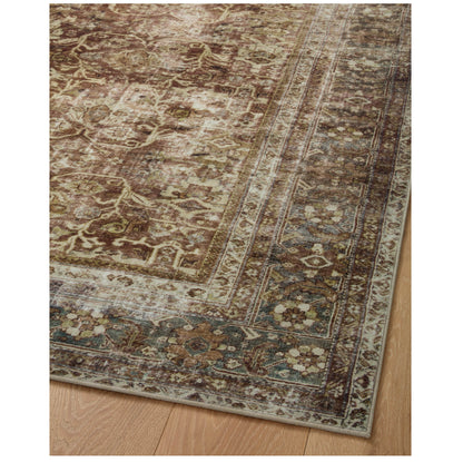 Sinclair Rust Lagoon Rug corner on wood floor