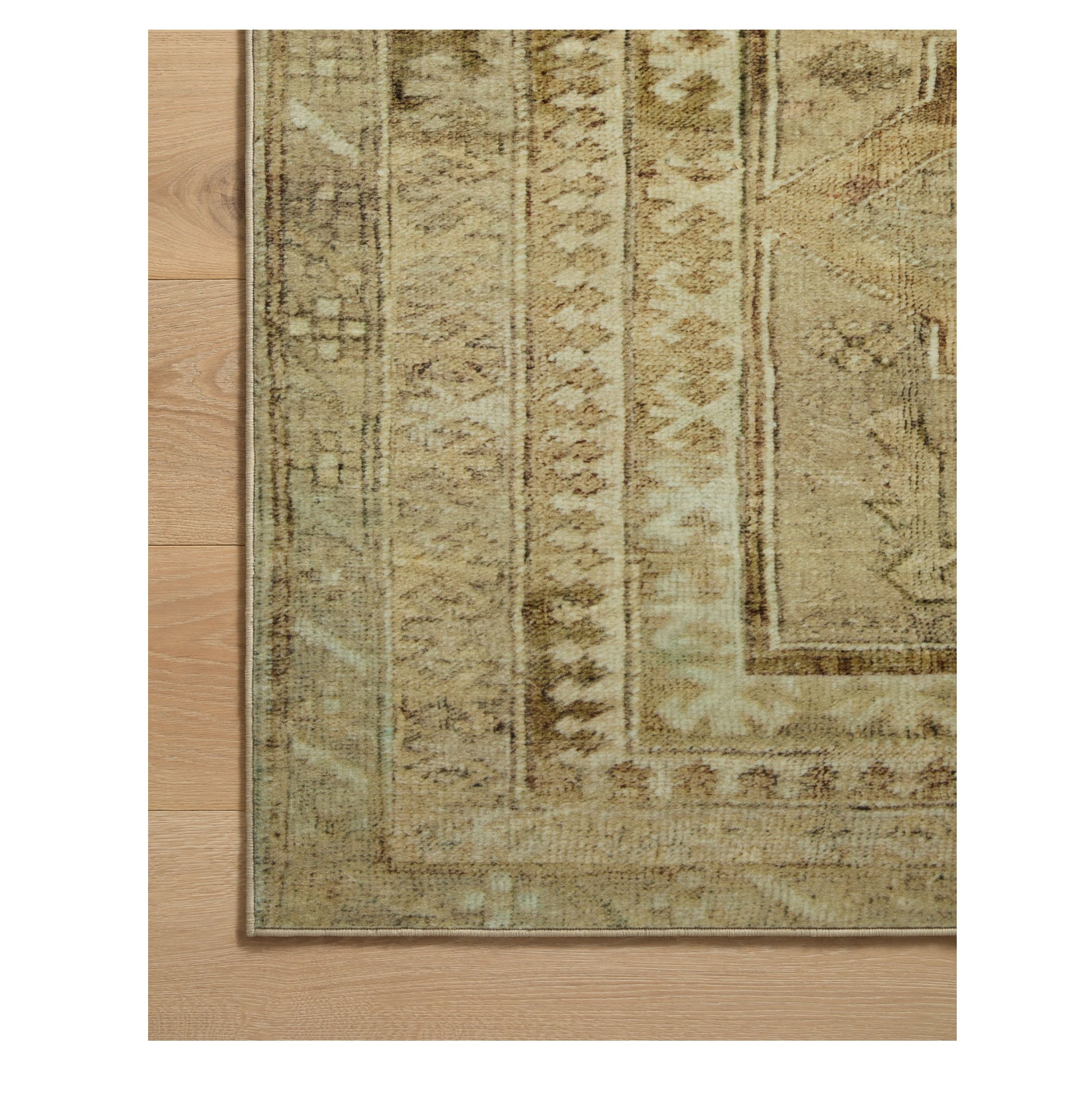 Sinclair Khaki Tobacco Rug corner on wood floor