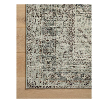 Sinclair Natural Sage Rug corner on wood floor