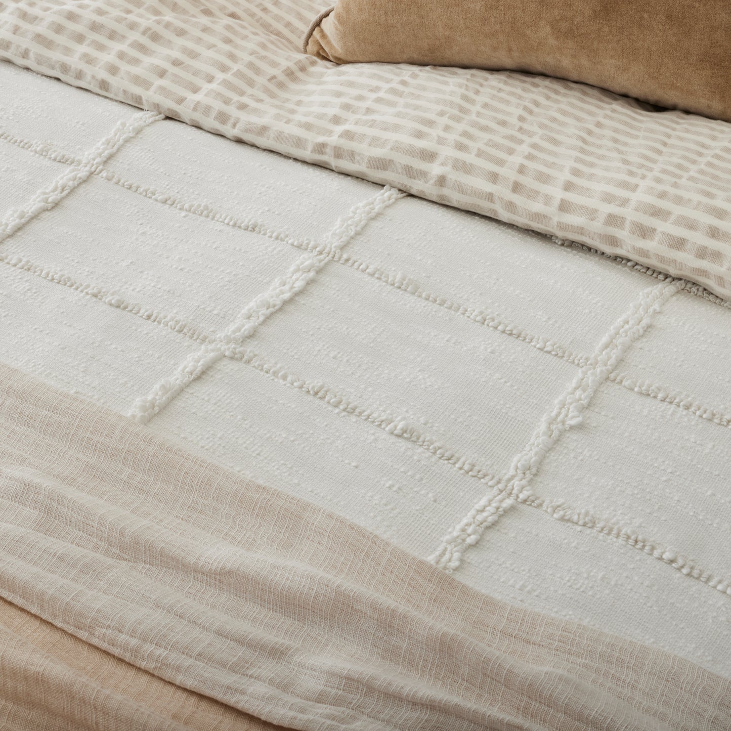 Optic White Textured Cotton Coverlet on made bed