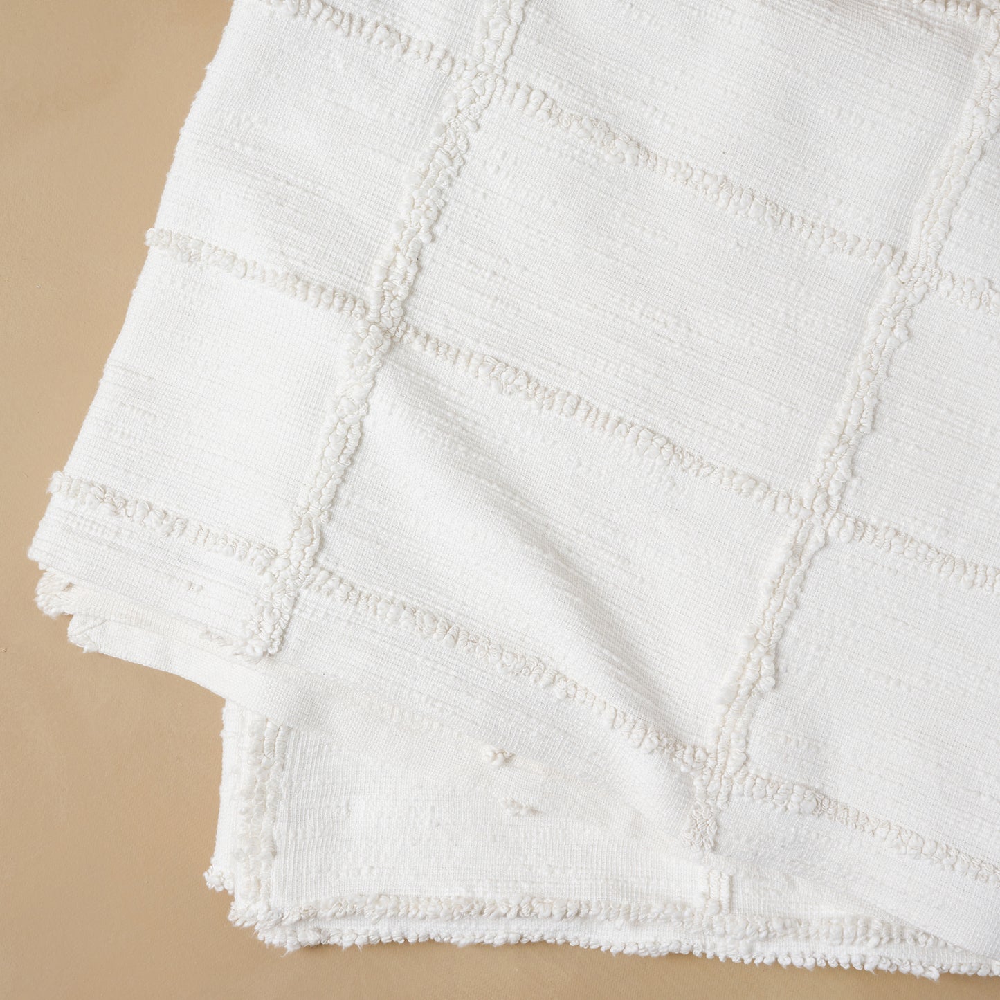 Close up of texture design in rectangle shape on Optic White Textured Cotton Coverlet