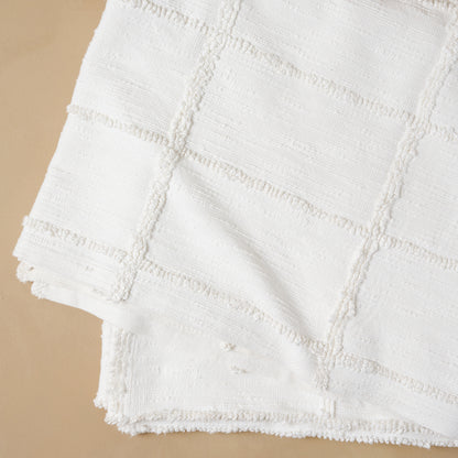 Close up of texture design in rectangle shape on Optic White Textured Cotton Coverlet