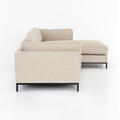 modern cream fabric sectional with right chaise with black metal base