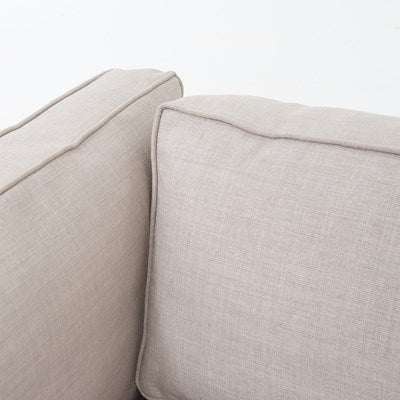 modern greige fabric sectional with right chaise with black metal base