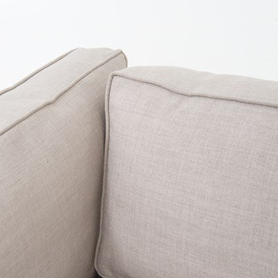 modern greige fabric sectional with right chaise with black metal base