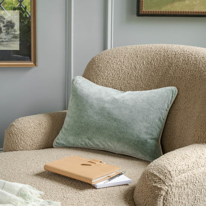 Ruby chaise lounge with notepad on it