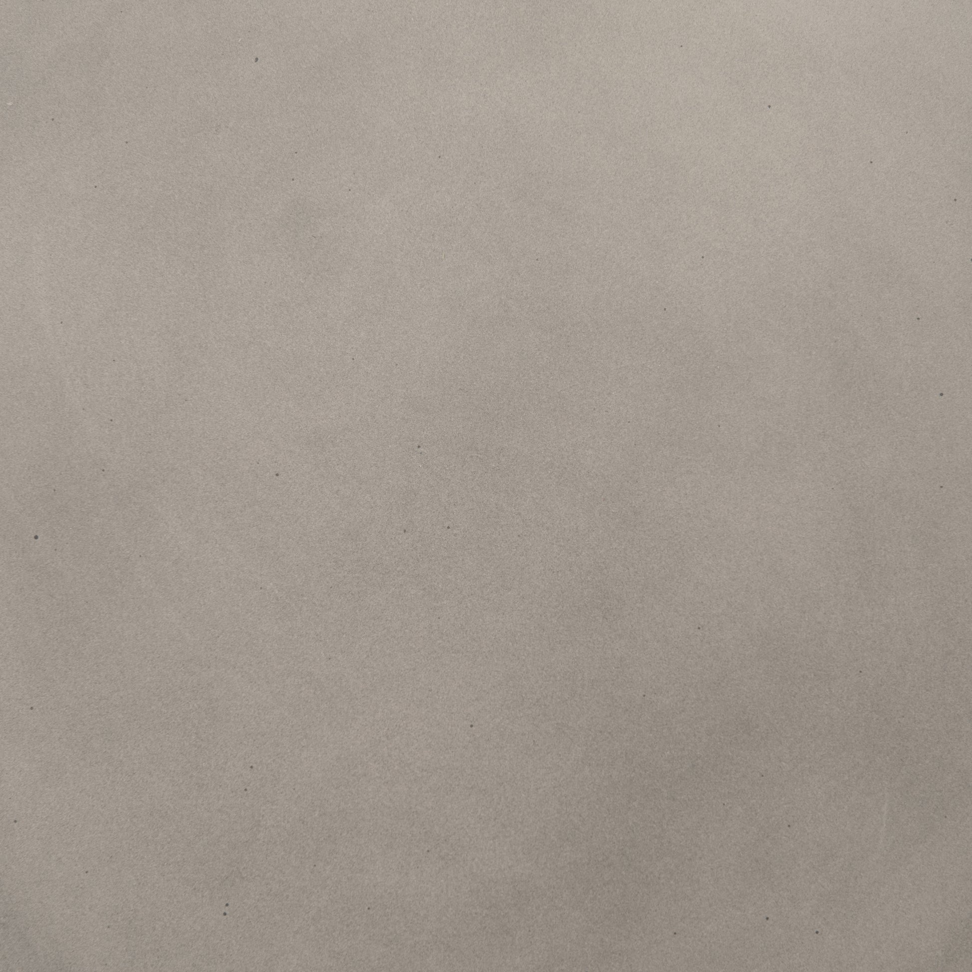 modern grey cylindrical end table with plaster finish