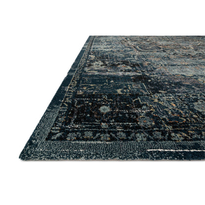 dark blue and ocean blue area rug with floral detail
