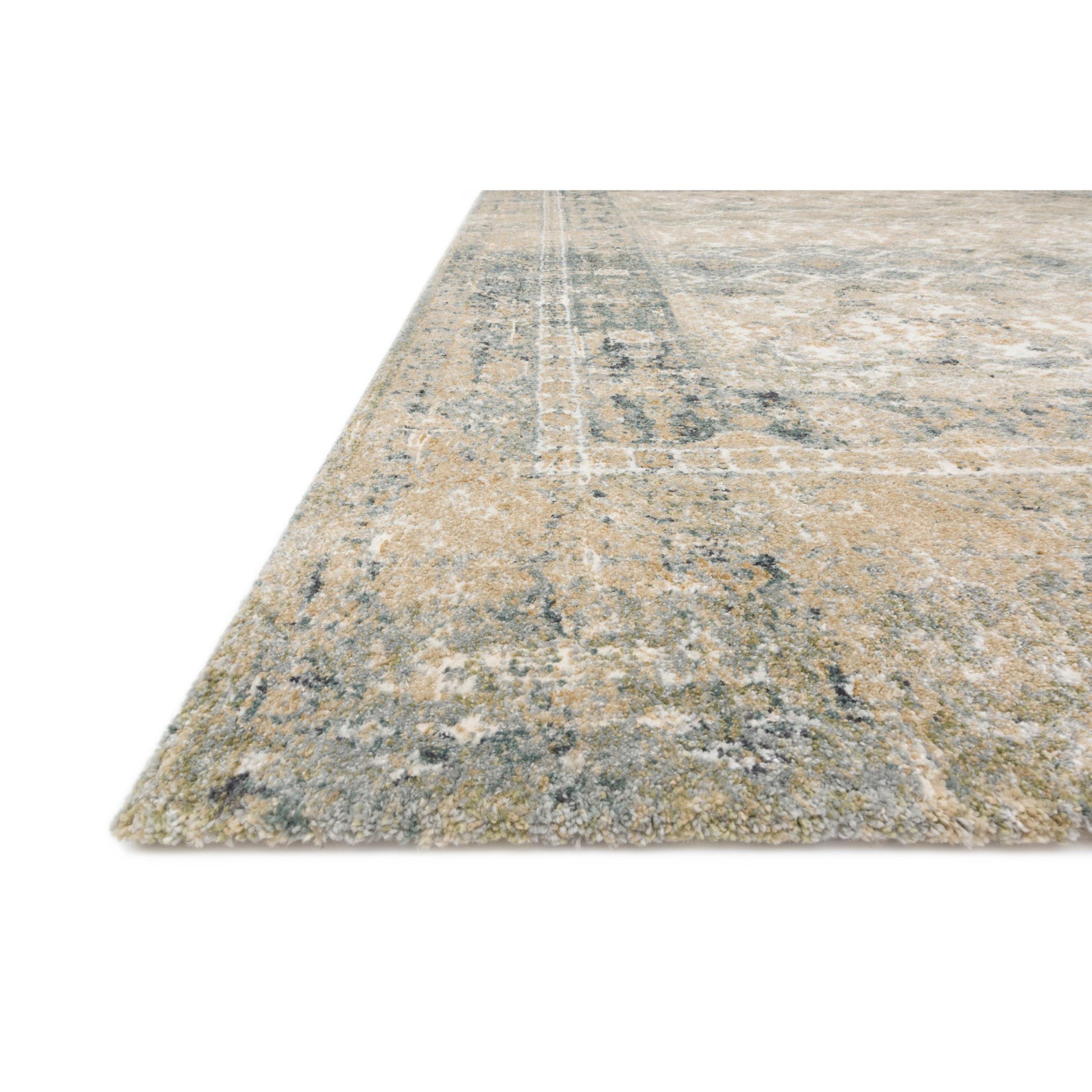 tan and cream traditional area rug with grey-blue undertones