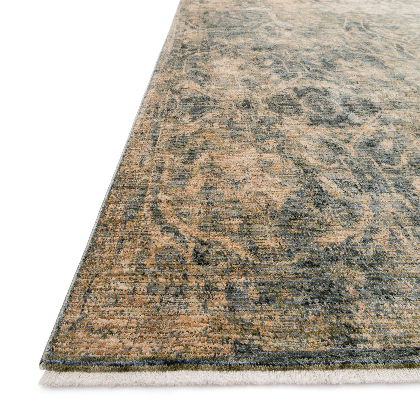 green and beige distressed rug