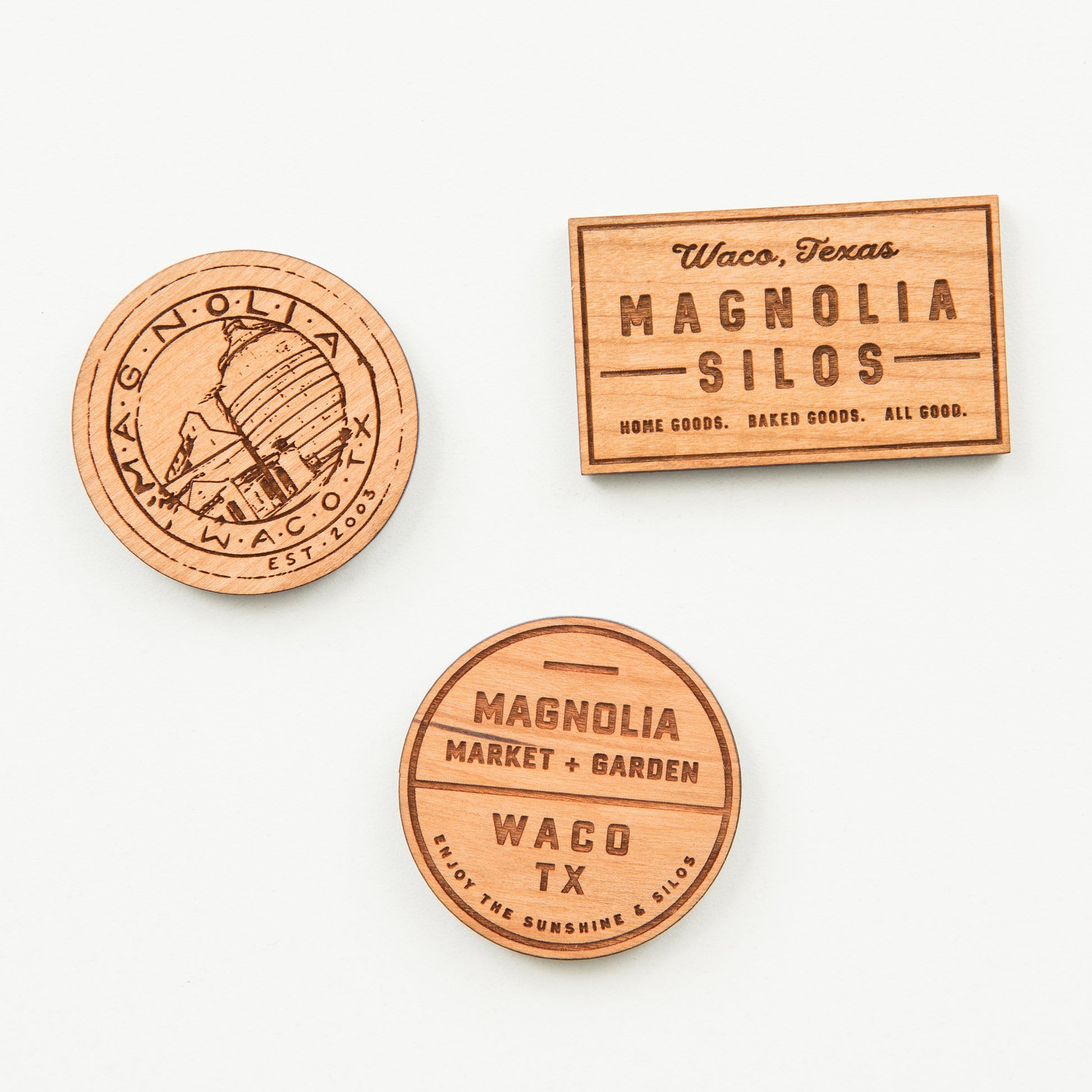 laser engraved wooden magnet with magnolia silos mural logo
