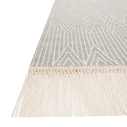 modern light gray and ivory rug with modern pattern and tassel fringe