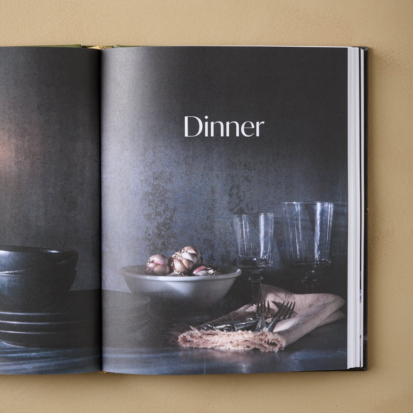 Joanna Gaines Magnolia Table Cookbook Volume 3 open to a page titled dinner