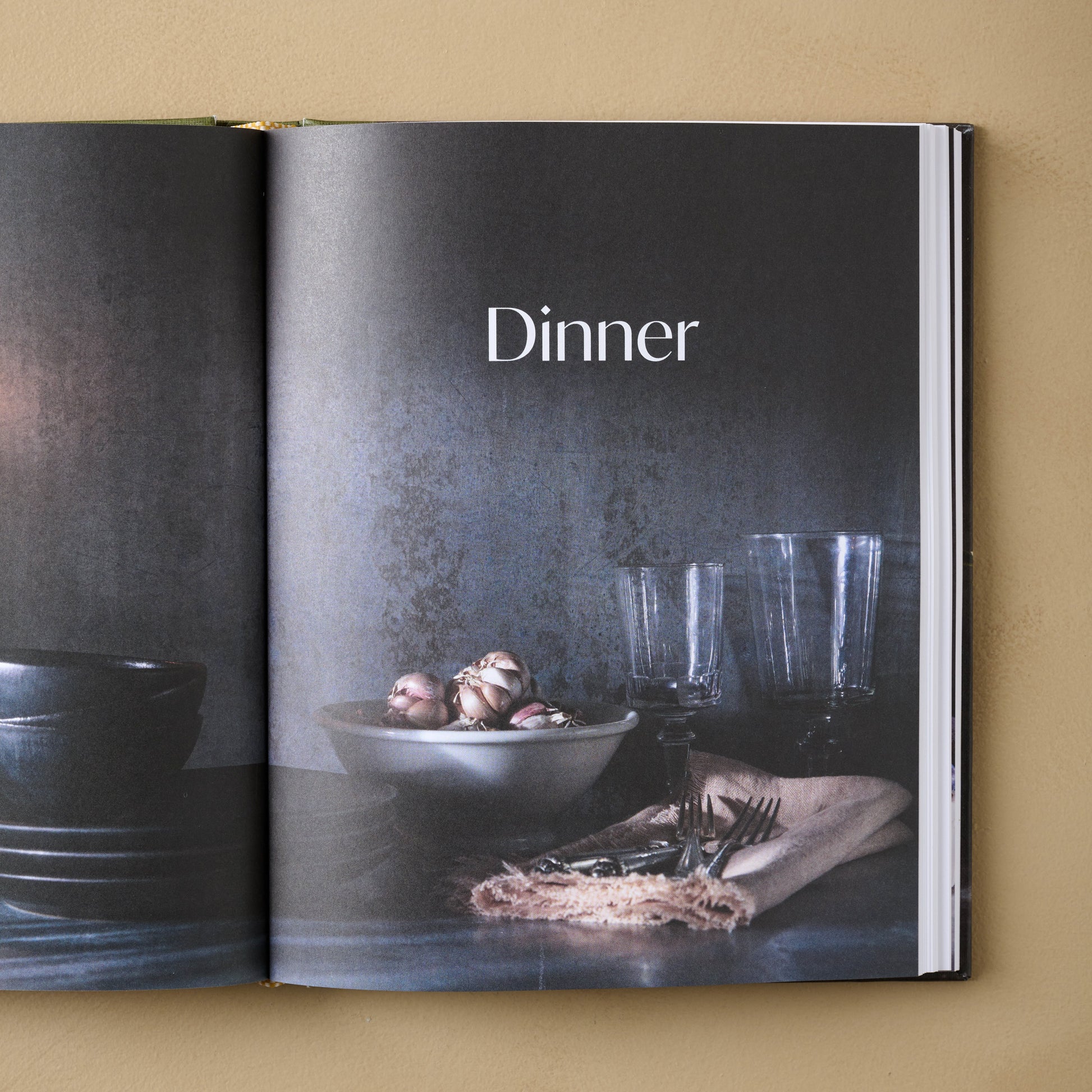 Joanna Gaines Magnolia Table Cookbook Volume 3 open to a page titled dinner