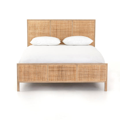 modern natural washed wooden bed with cane detailed headboard and footboard