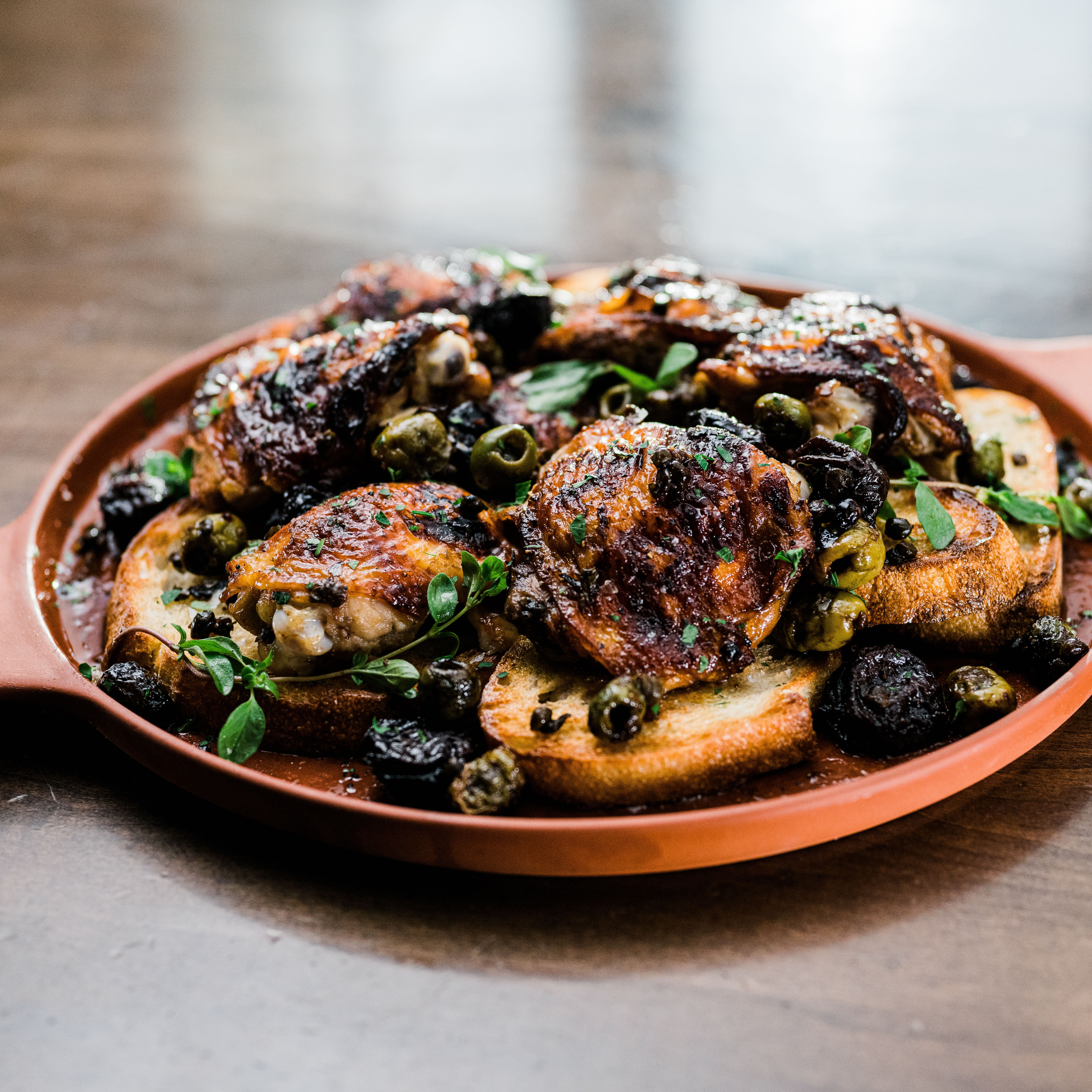 Abner & Amanda's Chicken Marbella Over Sourdough