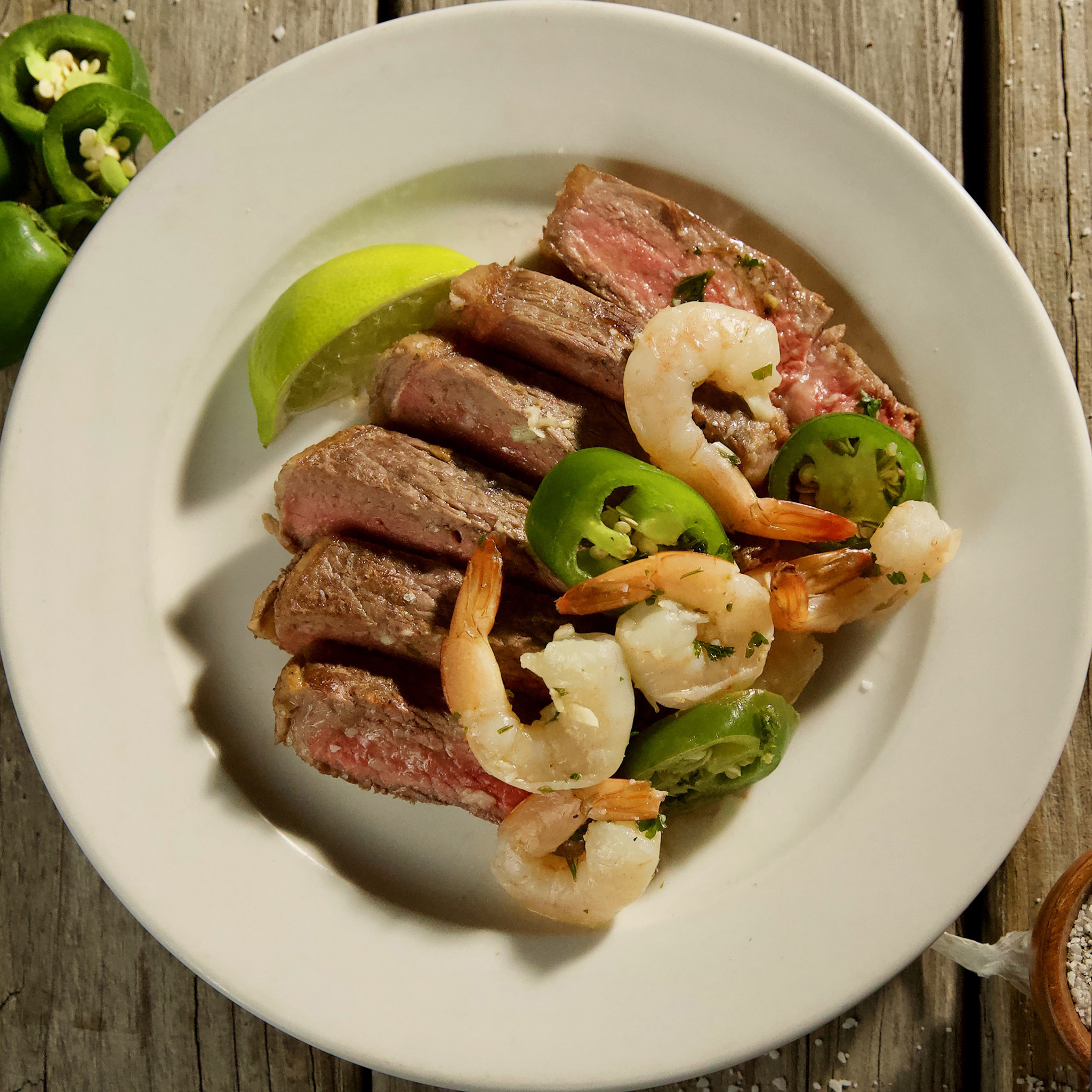 Elizabeth Poett's New York Steaks with Shrimp and Honey-Ginger Butter