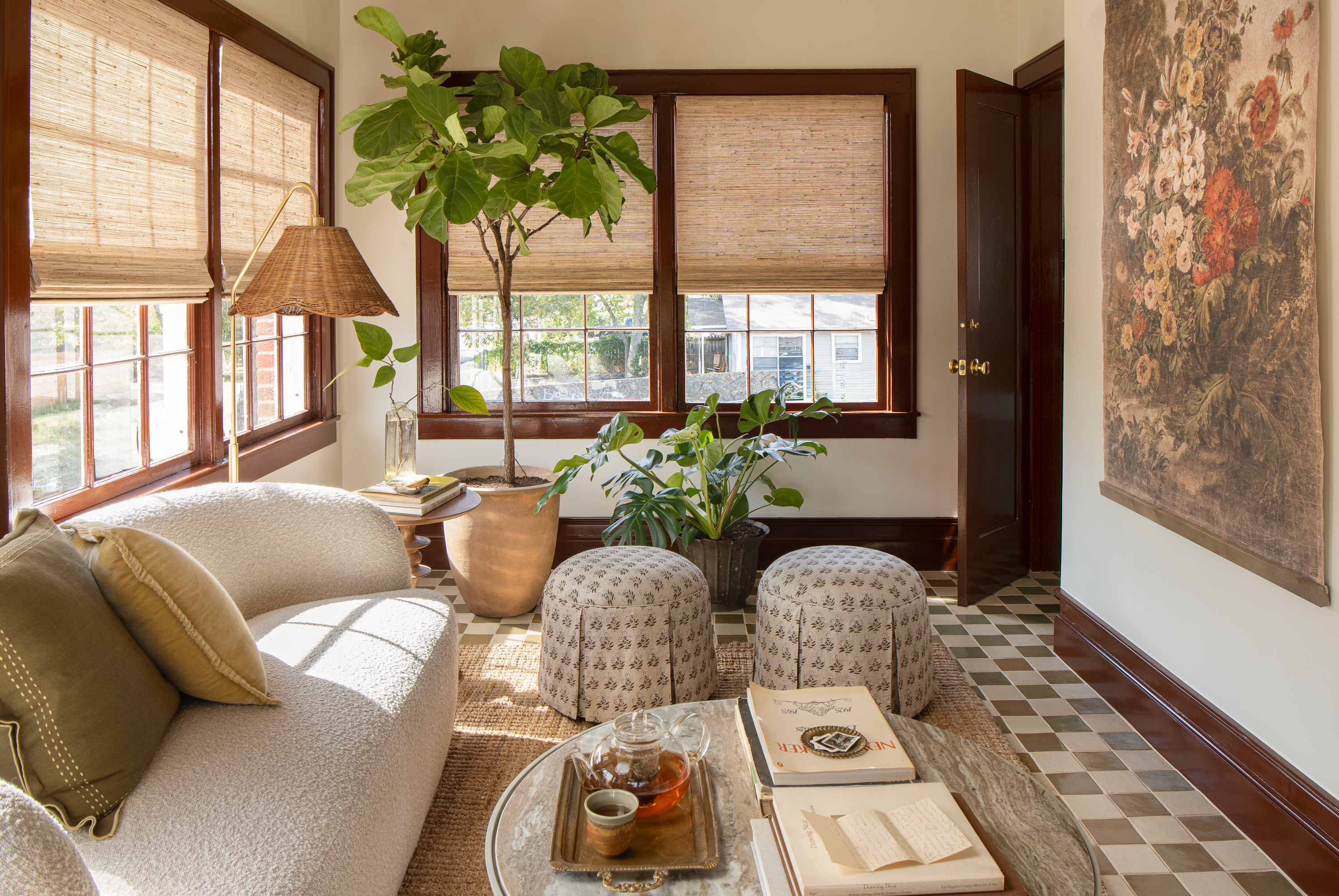 A classic, funky sunroom renovated by Joanna Gaines and featured on Mini Reni.
