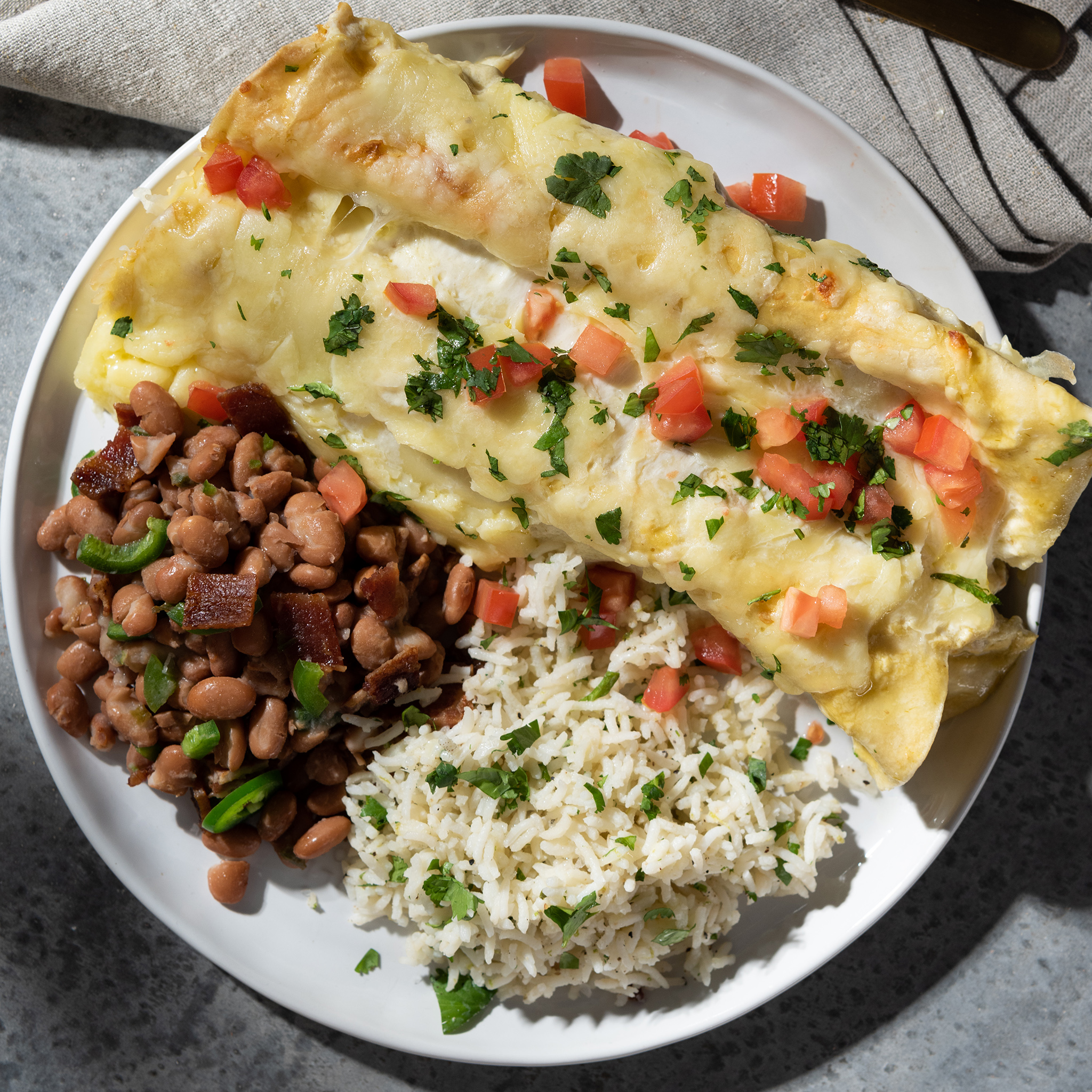 Magnolia Table Sour Cream Chicken Enchiladas