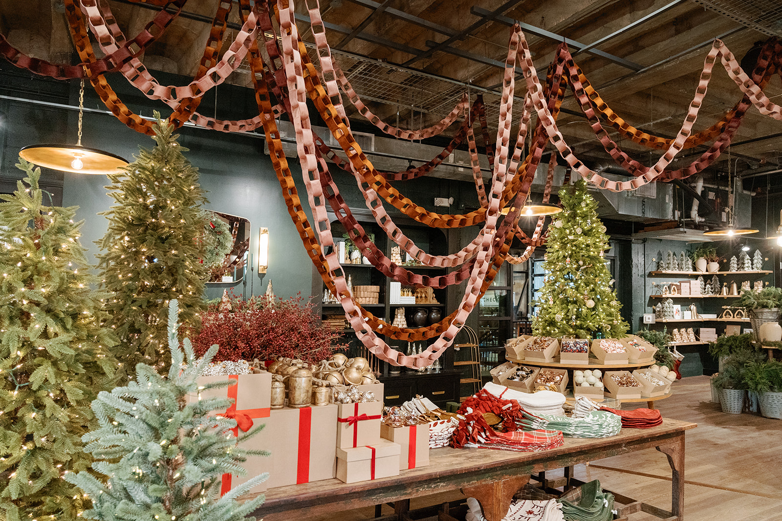 Velvet paper chains strung over displays inside Magnolia Market.