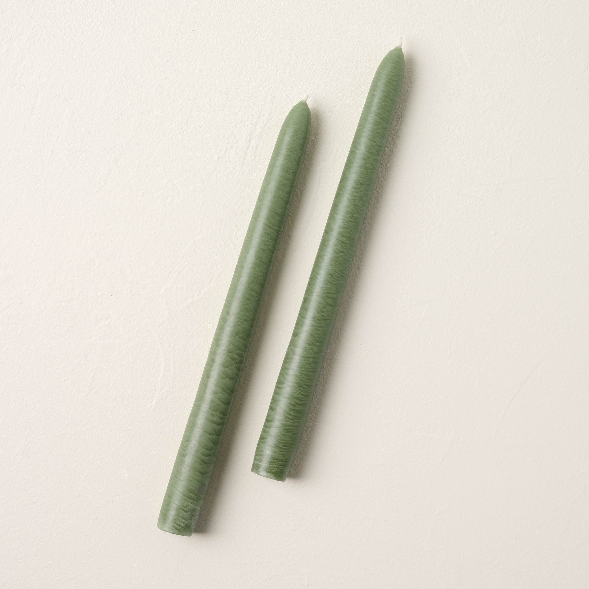 two colonial green taper candles $8.00