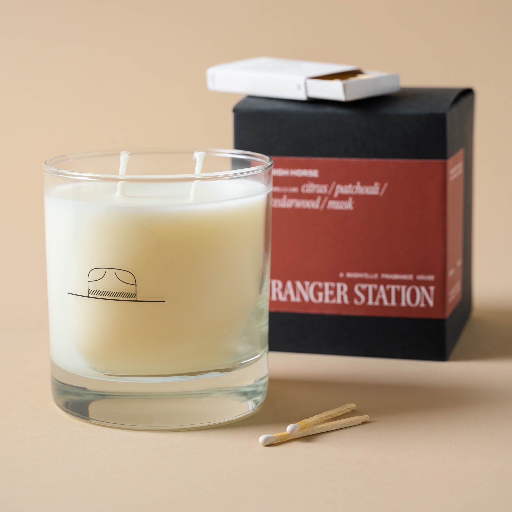 Ranger Station High Horse Candle next to packaging